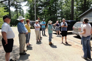 road association members at outdoor meeting